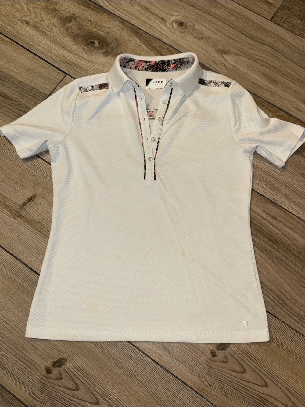 IZOD Women’s White Polo with Subtle Floral Trim